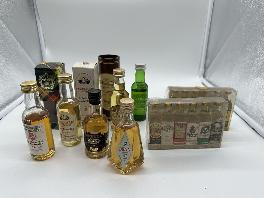 A collection of miniature whisky