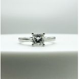 A 0.63ct diamond solitaire platinum ring