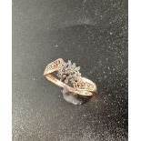 A 9ct rose gold cluster ring