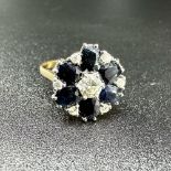 An 18ct yellow gold sapphire and diamond ring