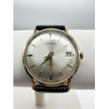 A 9ct gents gold watch