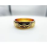 A 9ct yellow gold wedding band