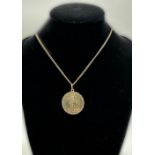 A 9ct yellow gold pendant