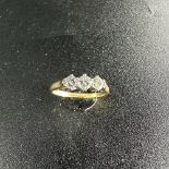 An 18ct yellow gold 3 stone diamond ring