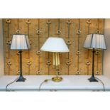 A pair of decorative painted metal classical column table lamps on square section bases, together