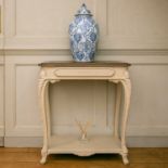 A French 19th century, cream painted oak console table with moulded frieze drawer on harebell