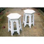 A pair of North African (possibly Moroccan) style hexagonal painted occasional tables with stop