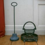 A Regency lyre form cast iron boot scraper on oval tray base with four cast lions paw feet, together