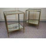 A pair of gilt brass and distressed mirror plate two-tier etageres with reeded column supports, in