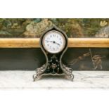 An Edwardian silver and tortoishell baloon clock, London, 1909 by William Comyns. With inlaid