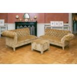 A two section deep button upholstered Chesterfield type sofas together with a matching cube