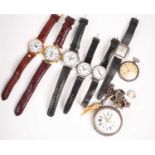 A collection of assorted watches including a silver Longines watch, Mondaine watches, two pocket