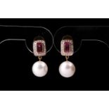 A pair of cultured pearl pink sapphire and diamond earrings, the square panel cluster terminating in