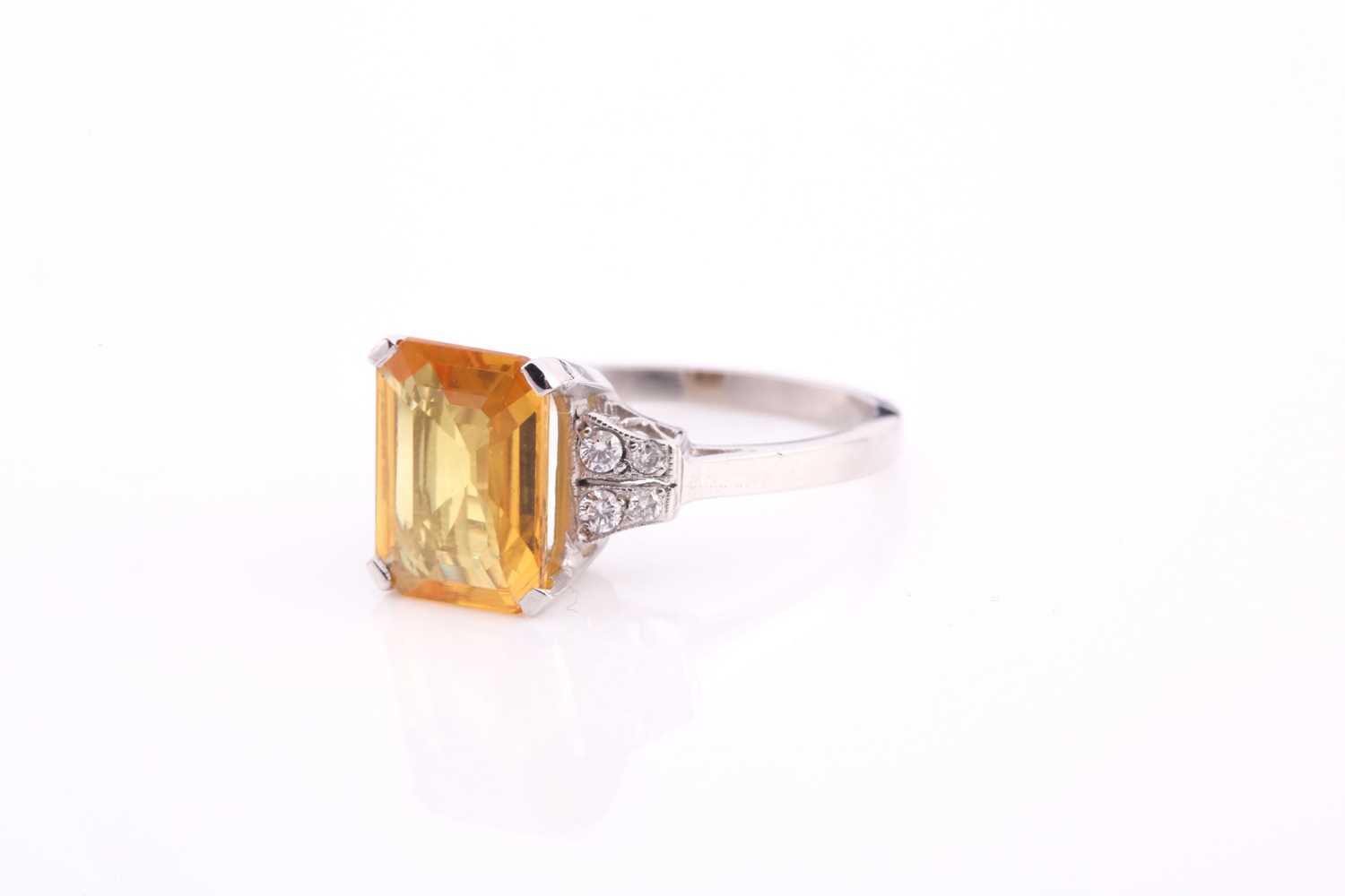 A yellow sapphire and diamond ring, the 10.5x8mm yellow sapphire with an estimated weight of 3.20ct, - Image 2 of 4