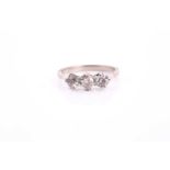 A diamond three stone ring, the three old-cut diamonds approximately 1.23cts, set in white metal,