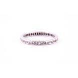 A diamond full eternity ring, millegrain set with eight-cut diamonds to a platinum mount, ring depth