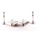 A pair of Victorian silver plated candlesticks. In late 18th century style, silver plated on copper;