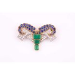 An Art Deco style emerald, sapphire and diamond brooch, the emerald-cut emerald, with round mixed