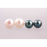 Two pairs of freshwater pearl earrings, one pair with a light cream 9.5-10mm bouton pearl to each,