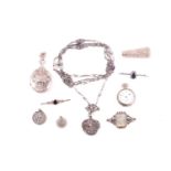 A collection of Victorian and later silver and white metal jewellery and watches, including an