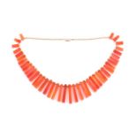 An Art Deco style carnelian fringe necklace, set on a beaded chain with 14ct gold clasp, 38 cm