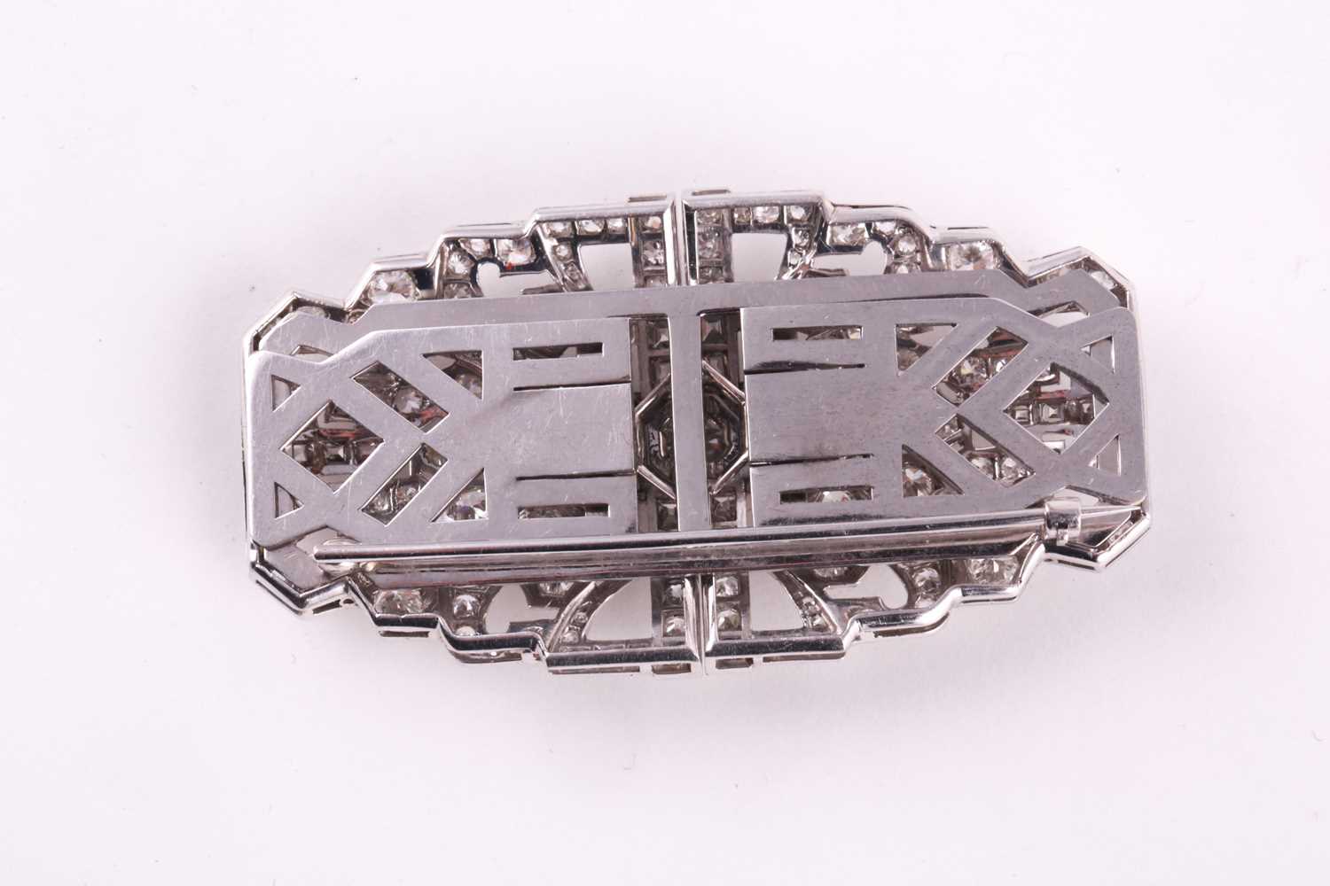 An Art Deco diamond lapel brooch, the large rectangular openwork mount centred by a collet set round - Image 2 of 5