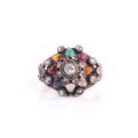 A 12ct gold 'Thai Princess' gem-set ring, set with white sapphires and multi-coloured gems. Ring