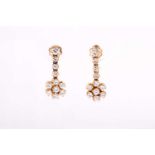 A pair of articulated drop cluster earrings, set with round brilliant cut Diamonds weighing