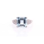 An aquamarine and diamond ring, the square step cut aquamarine weighing an estimated 2.80ct