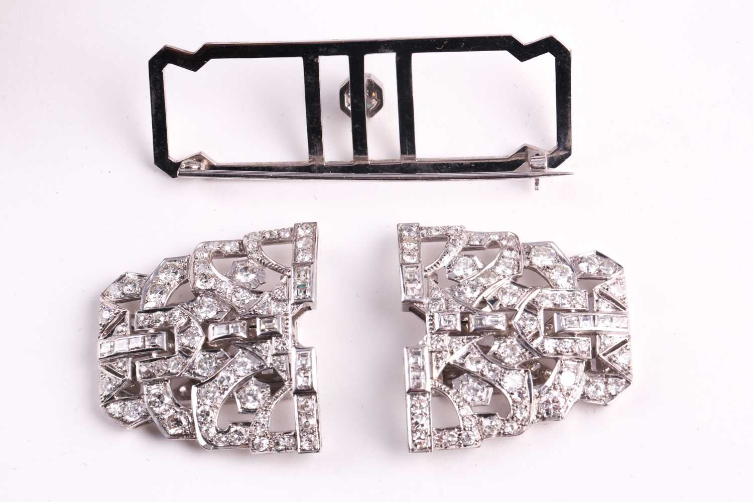 An Art Deco diamond lapel brooch, the large rectangular openwork mount centred by a collet set round - Image 4 of 5