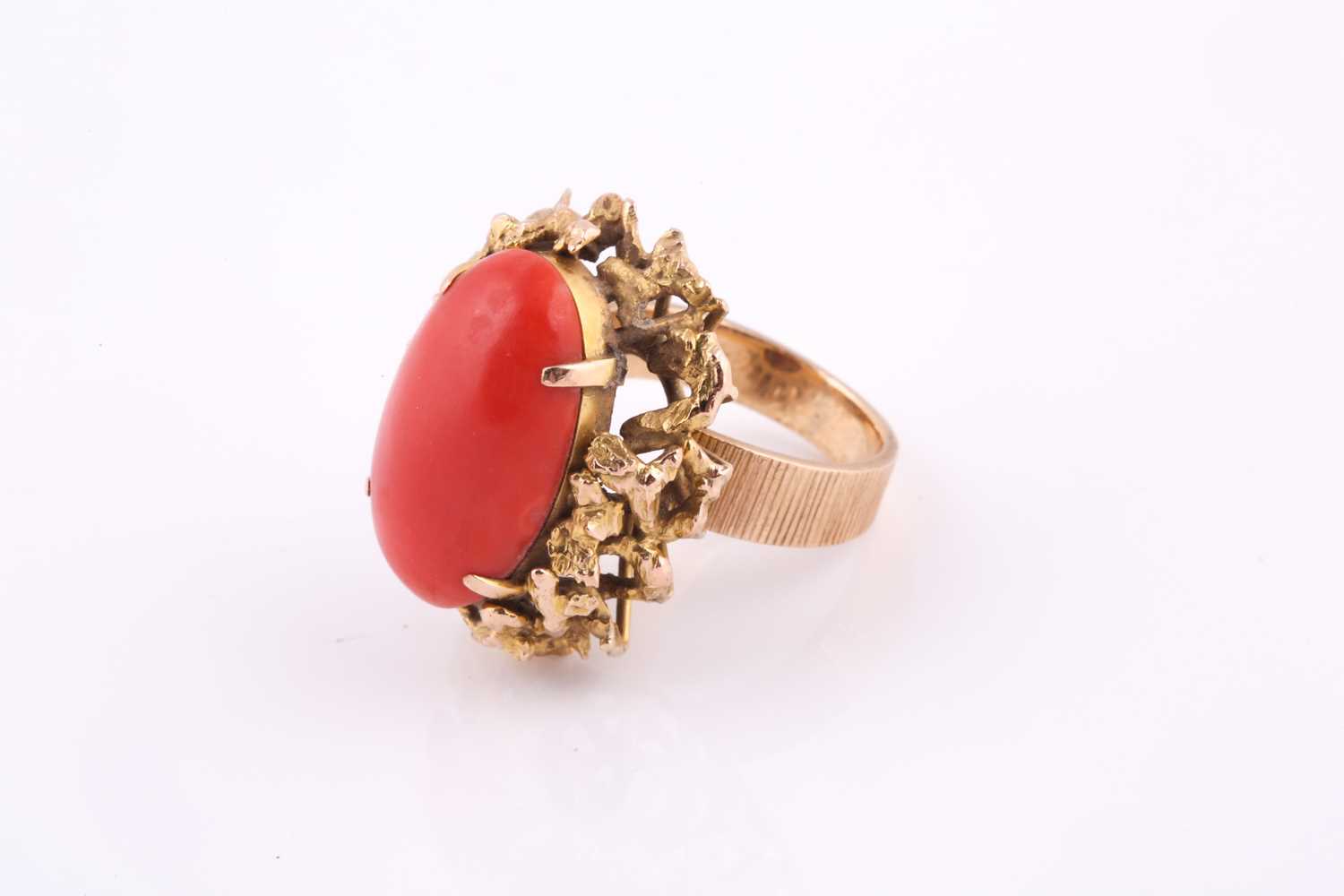 A 1970’s Continental gold and coral cabochon ring, the oval cabochon approximately 21.5mm x 13mm, - Image 2 of 4