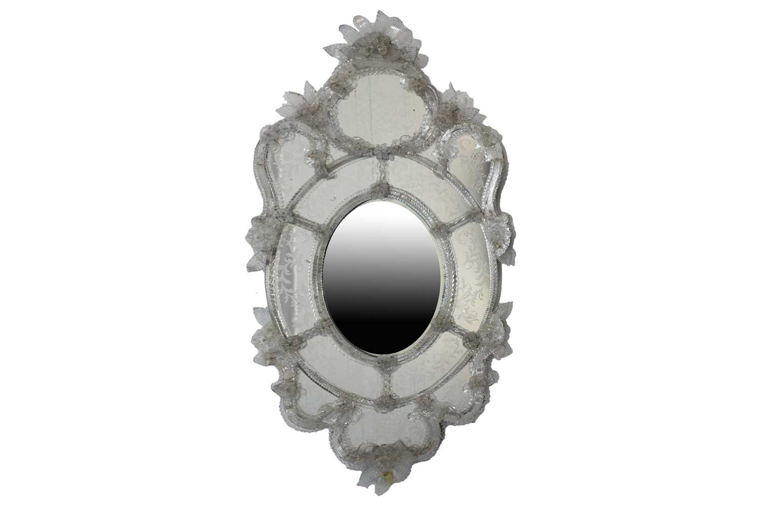 A Venetian cartouch form wall mirror, late 19th century, decorated with etched detail and drawn
