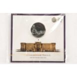 An uncirculated QEII 2015 Buckingham Palace £100 silver coin.