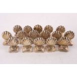 A set of 16 sterling silver scallop shell form name place holders of shell form each on a loaded