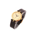 A Gucci quartz wristwatch with a 30mm gold plated case, a gold colour dial and roman numerals on a