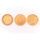 Three half sovereigns; two dated 1982 and one 2015.