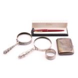 A Victorian silver cigarette case, Chester 1890, 9cms by 6.5cms; two silver handled magnifying