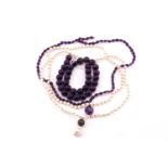 An amethyst necklace, line of compressed oval beads spaced with diamond pavé set spherical links,