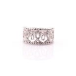 An 18ct white gold and diamond half eternity band, the openwork band inset with small diamonds,
