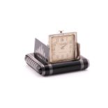 An art deco black enamel Dunhill Tavannes chronometre silver travel clock with a Swiss hand-wound