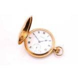 An 18 carat gold hunting cased pocket watch; the white enamel dial signed H Samuel; Roman numerals