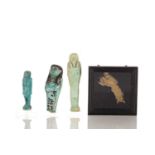 Three Egyptian Faience Ushabti, comprising a 'Wab Priest', circa 900 BC, the turquiose glaze body