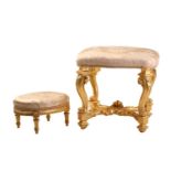 A Louis XIV style carved wood and gilt gesso rectangular boudoir stool with stuff over upholstered