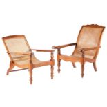 An Anglo-Indian teakwood and split cane plantation chair, 19th/20th century. With swivelling leg