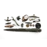 A collection of antiquities, comprising a Roman bronze Camulodunum Type V Fibula, known as a Dolphin