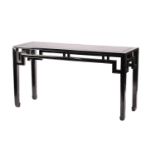 A Chinese black lacquered rectangular altar table, 20th century. With moulded openwork frieze on