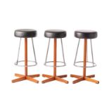 A set of three Dyrlund Smith of Denmark "Mid-Century Vintage" teak breakfast bar stools with