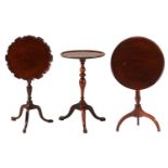 An early 19th-century mahogany circular dish topped tripod wine table with inverted sabre