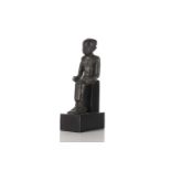 An Egyptian seated bronze figure of the scribe Imhotep, 26th dynasty, 630 - 525 BC, the figure