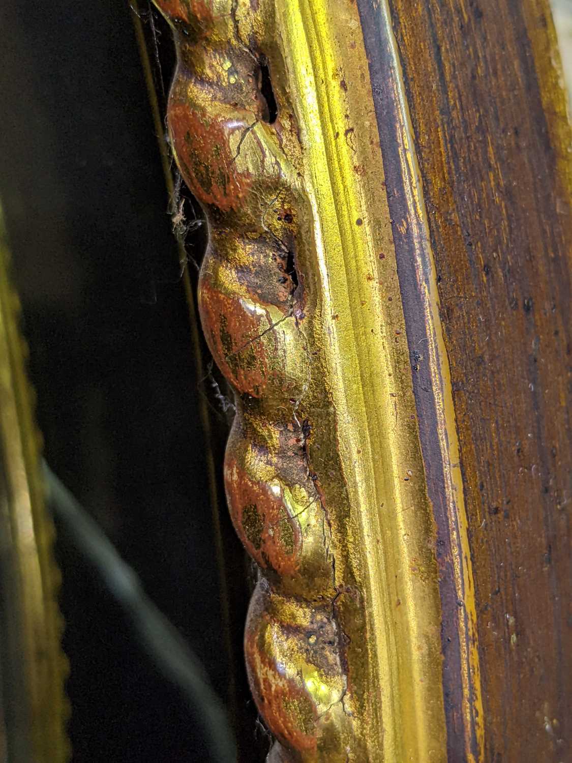 A pair of George III Adam style gilt framed oval mirrors, 20th century, with moulded paterae between - Image 4 of 5
